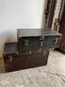 A pair of vintage metal exterior travelling trunks, largest measures 53cm x 48cm x 102cm