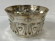 A bowl in the aesthetic movement style inscribed to edge From Her Majesty Queen Alexandra to Mr