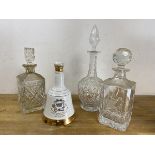 A collection of decanters including a Bells whisky commemorative Prince William of Wales 21st June