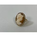 A 9ct gold shell cameo ring, size J, weighs 4.1 grammes