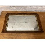 A 19thc over mantel mirror, the rectangular glass within gilt frame, within a walnut frame with wood