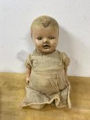 A vintage doll a/f, measures 30cm high