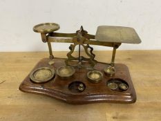 A set of vintage scales inscribed Rates of Postage Not Exceeding 1 Ounce 1d down to 16 - 5, along