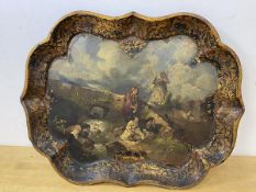 A 19thc painted tray, the scalloped edge with gilt decoration, well depicting figures by stream near