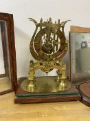 A late 19thc skeleton clock inscribed Walter Rutherford Jedburgh, measures 24cm high with later case