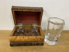 A novelty liquor set with two decanters and six glasses within faux books, measures when closed 13cm