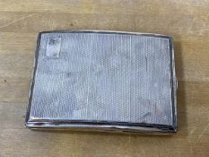 A 1928 Birmingham silver cigarette case with engine turned exterior, weighs 140 grammes