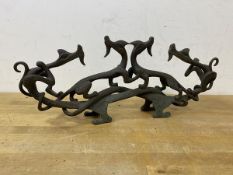 A Taiwanese cast metal table ornament of entwined dragons, measures 14cm high x 35cm x 6cm