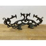 A Taiwanese cast metal table ornament of entwined dragons, measures 14cm high x 35cm x 6cm