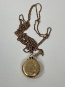 An open faced pocket watch, case marked 585, measures 3cm diameter, along with chain (markings