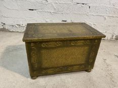 An early 20thc aesthetic style beaten brass coal box, measures 33cm x 51cm x 31cm