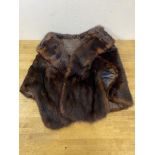 A fur shawl, labels to interior, made and styled in Canada, a Star Petite, measures 33cm across