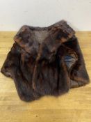 A fur shawl, labels to interior, made and styled in Canada, a Star Petite, measures 33cm across