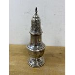 A 1960's Birmingham silver sugar caster, measures 18cm high and weighs 110 grammes