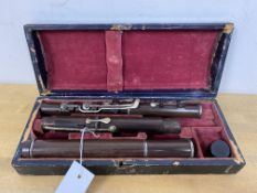 A wooden flute in original box, flute is inscribed Rudall and Rose Number 15 Plazza Covent Garden