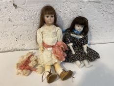 A Victorian Simon & Halbig bisque head German doll, marked KR117, she has fixed eyes and mouth