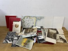 A mixed lot including three tourist maps number 40, 48 and 41.49, a quantity of postcards, also