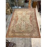 A north west Persian rug with central floral star medallion within a foliate field and borders, a/