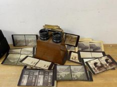 An early 20thc stereoscope with collection of slides including those depicting mountains, glaciers