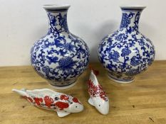 A pair of modern Chinese vases of bulbous form, foliate blue and white pattern, blue seal marks to