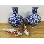 A pair of modern Chinese vases of bulbous form, foliate blue and white pattern, blue seal marks to