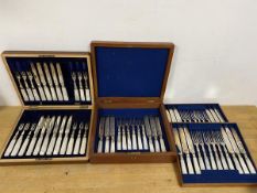 An early 20thc canteen with a set of 18 knives and forks, with mother of pearl handles, and