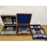 An early 20thc canteen with a set of 18 knives and forks, with mother of pearl handles, and