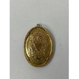 An Edwardian Birmingham locket marked 9 and .375, measures 4cm and weighs 5.23 grammes