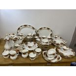 A part Royal Albert, Country Rose pattern, dinner service including coffee pot which measures 26cm