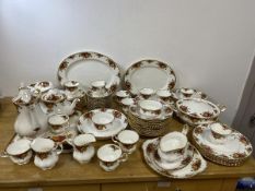 A part Royal Albert, Country Rose pattern, dinner service including coffee pot which measures 26cm