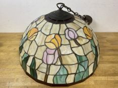 A Tiffany style hanging light shade, measures 30cm approximately to top of shade by 50cm diameter at