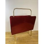 A retro style magazine rack with polished textured metal sides, measures 57cm high x 46cm x 16cm