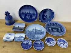 A collection of Danish china including wall plates, trinket dishes, and a bell which measures 13cm