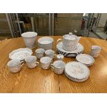A mixed lot of Denby Dauphine china including a teapot which measures 16cm high, six teacups, dinner