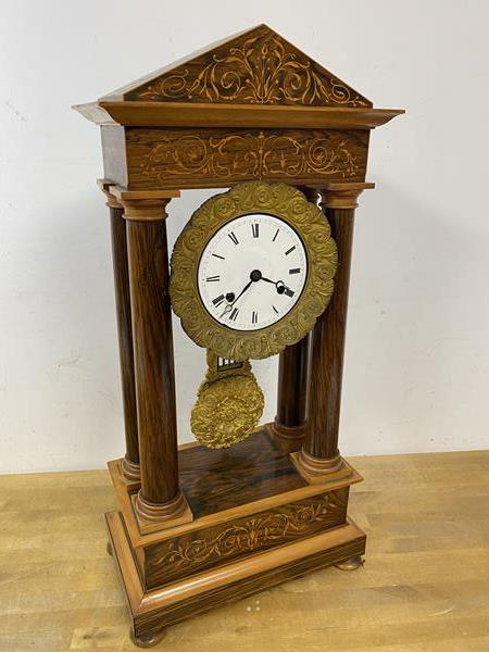 An early 20thc Portico clock, the movement inscribed Neuens Oline Paris ? measures 53cm high