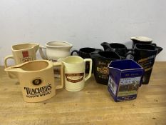 A collection of ten whisky water jugs including those by Teacher's, Seagram's, Limited Edition jug