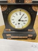 A late Victorian slate mantel clock of architectural form with marble segments, dial with roman