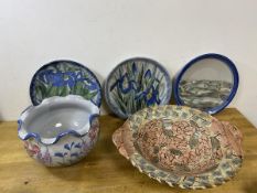 Three Scottish stoneware decorative wall plates, two with iris decoration and the other with
