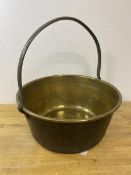 A fixed handle brass preserve pan which measures (with handle) 38cm x 36cm