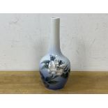 A Royal Copenhagen bud vase with floral and bee decoration, measures 20cm high