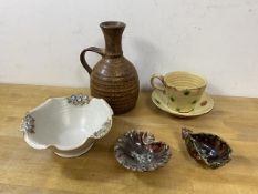 A collection of Studio Pottery including a cup and saucer, saucer stamped J B S with fleur de lys,