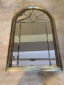 A modern Florentine style wall mirror each panel bevelled with scroll surmount and parcel gilt and