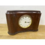 A late 19th early 20thc mahogany mantel clock of kidney shape with beaded top and moulded base on