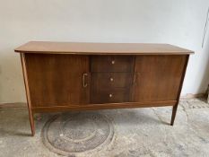 A Vanson sideboard, the shaped rectangular top with moulded edge, central bank of three drawers, top