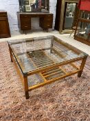 A Peirre Vandel coffee table, the square top over lower tier with two glass panels flanking a railed