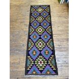 A Maimana Quillam runner with a repeating geometric diamond field, measures 195cm x 62cm