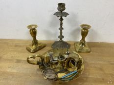 A mixed lot including two brass candlesticks, measuring 12cm high, another candlestick, chamber