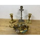 A mixed lot including two brass candlesticks, measuring 12cm high, another candlestick, chamber