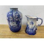 A Dutch blue and white vase with raised figures of boy and girl before fishing boats, stamped