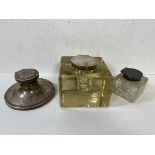 A group of inkwell's including a large glass ink well with 1945 Birmingham silver lid, measures